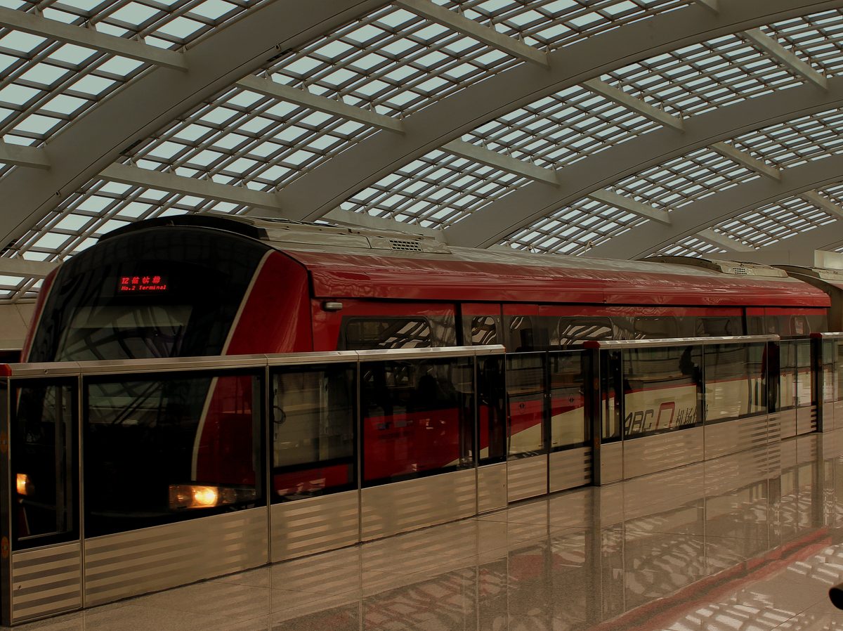 A modern airport express train platform
