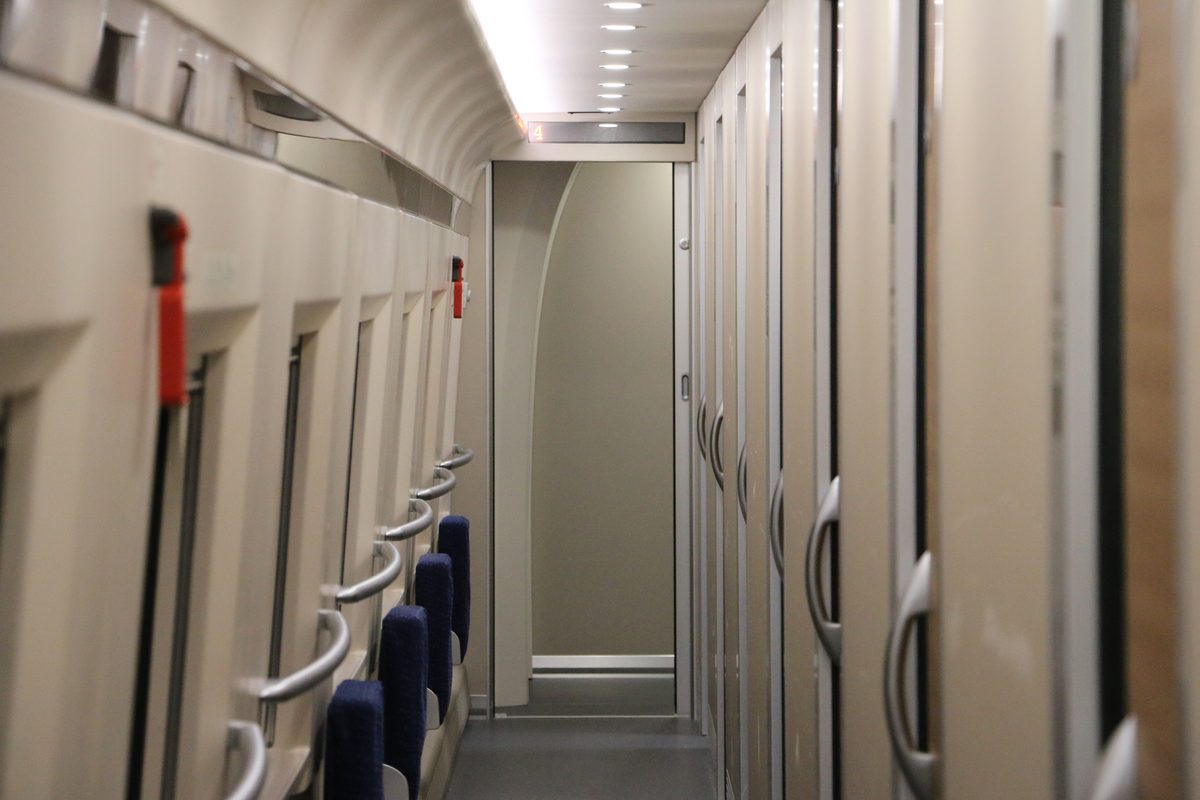 The interior of a Chinese sleeper carriage with berths