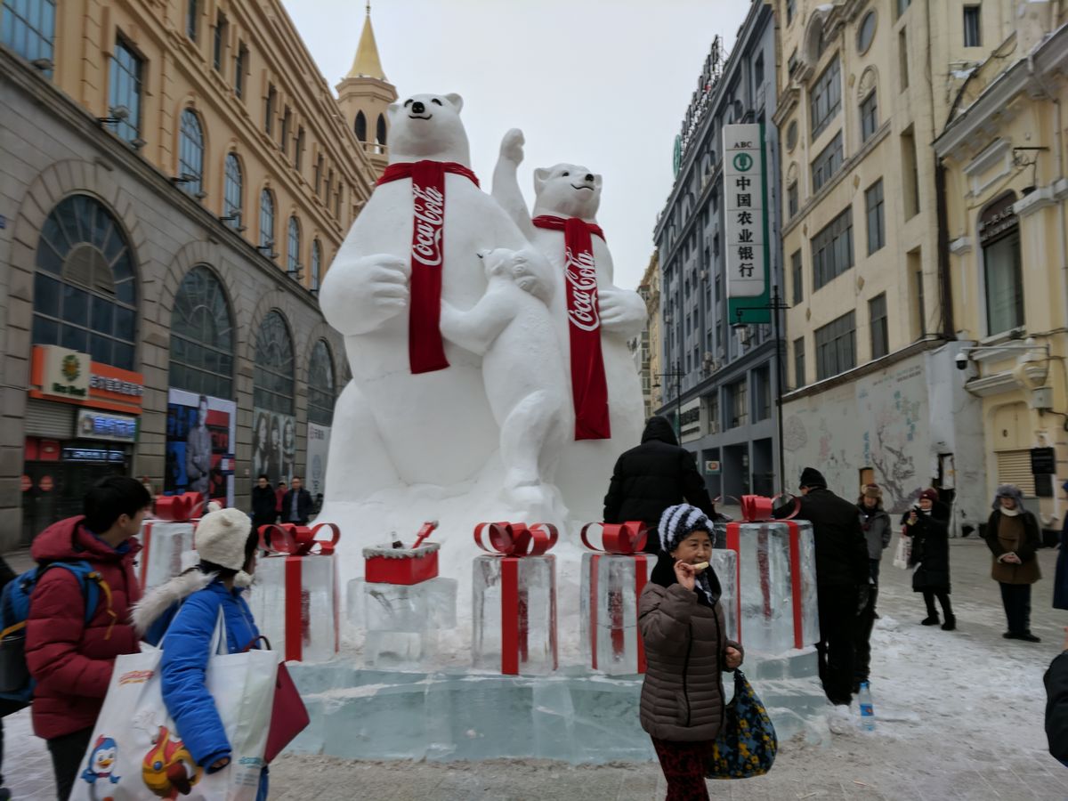 Snow-covered Harbin street with ice sculptures