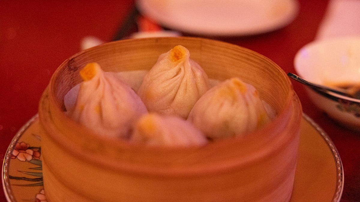 Shanghai xiaolongbao soup dumplings in a bamboo steamer
