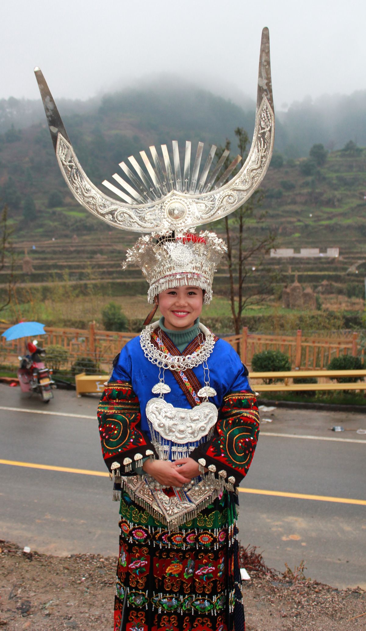 Miao silver jewelry and embroidered costume