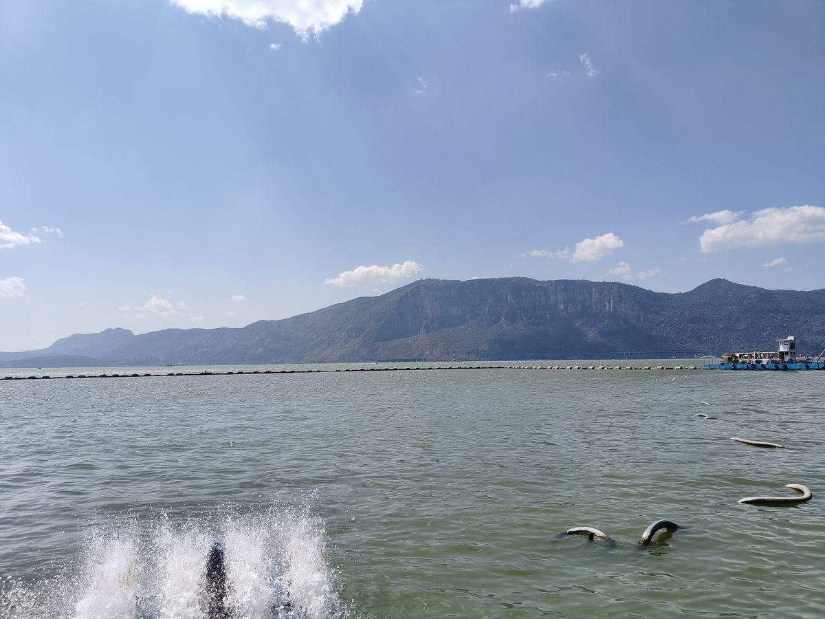 File:20260222 Kunming Dianchi Lake, looking at the West Mountain from the East Bank.jpg