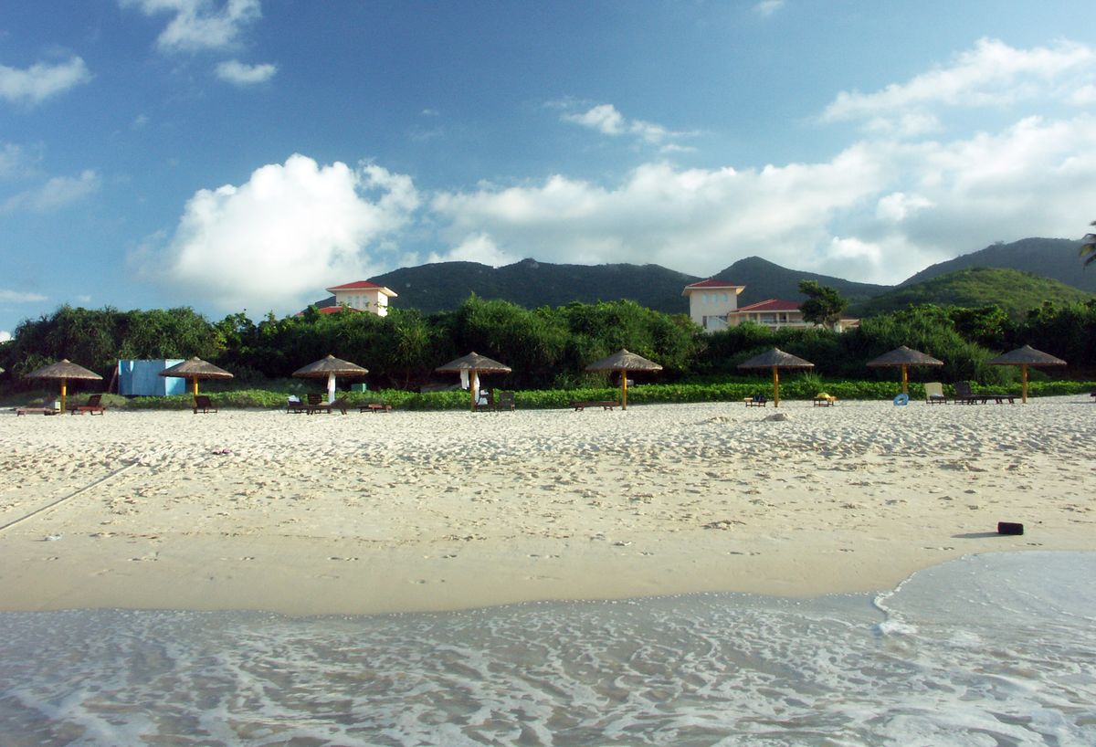 A palm-lined beach in Sanya, Hainan’s tropical resort city